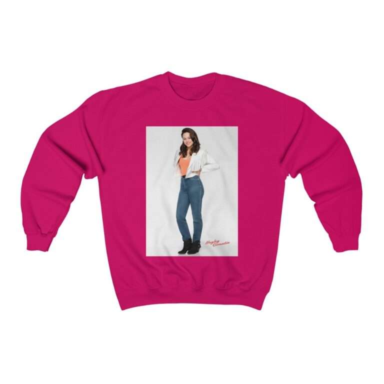 Actress Hayley Orrantia in White Jacket and Orange Top - Sweatshirt - Image 13