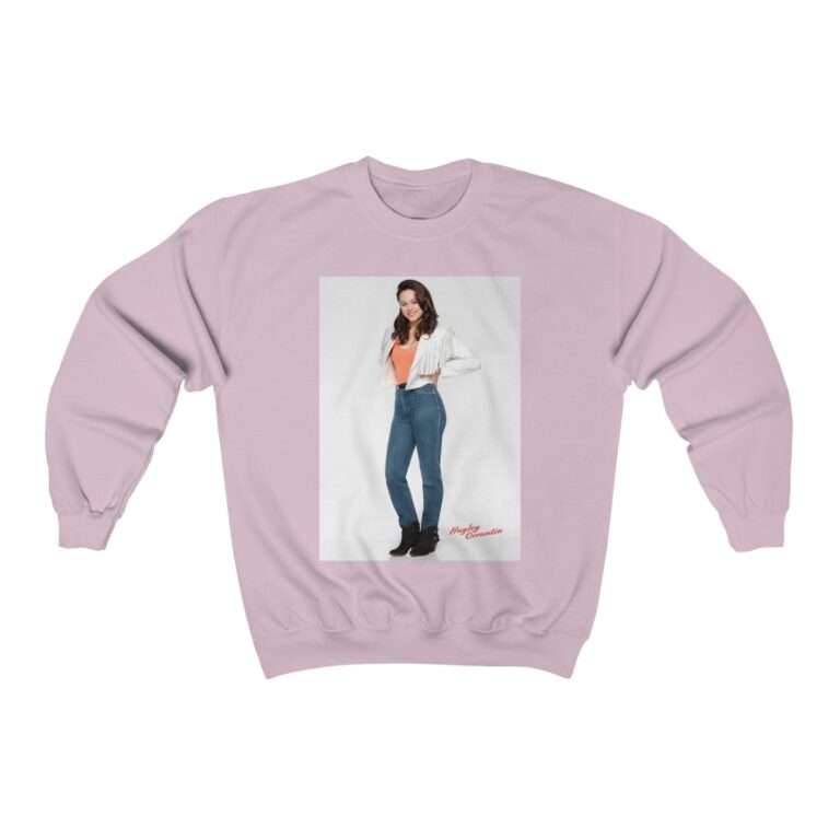 Actress Hayley Orrantia in White Jacket and Orange Top - Sweatshirt - Image 12