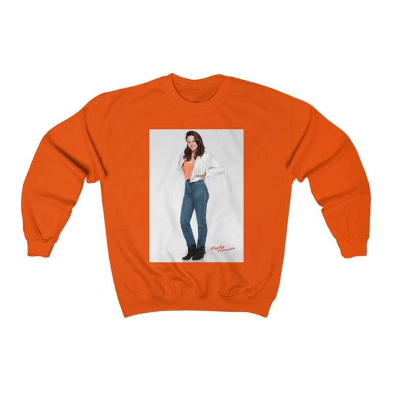 Actress Hayley Orrantia in White Jacket and Orange Top - Sweatshirt - Image 5