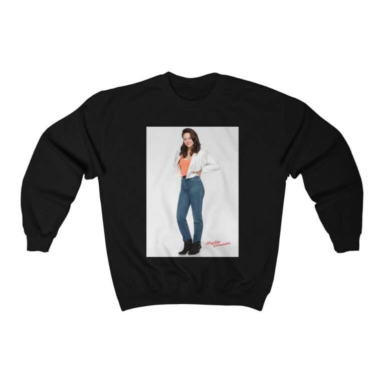 Actress Hayley Orrantia in White Jacket and Orange Top - Sweatshirt - Image 3