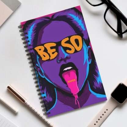 Spiral notebook with print of erotic woman face tong out drawing