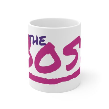 Front of ceramic mug with bold pink hand script of "THE BOSS"