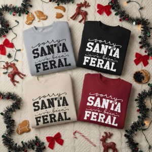 Sorry Santa I've Been Feral Sweatshirt Unisex | Funny Christmas Crewneck | Naughty List Holiday Jumper | Rebel Elf Shirt | Cozy Festive Pullover